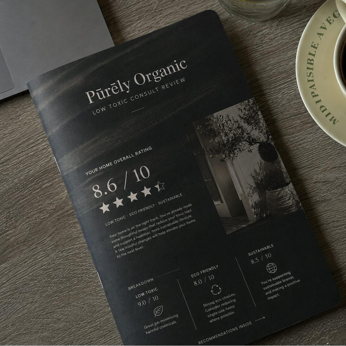 Inside the Low Toxic Consult Review booklet, showing an overall home rating out of ten with low-tox, eco friendly and sustainable scores
