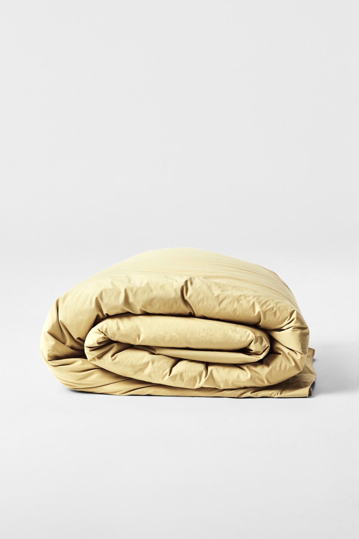 Studio Sutram Maize duvet cover, side view showing the framing border