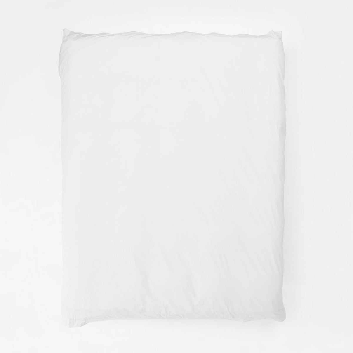 Studio Sutram Prism duvet cover in pure white organic cotton percale on a bed