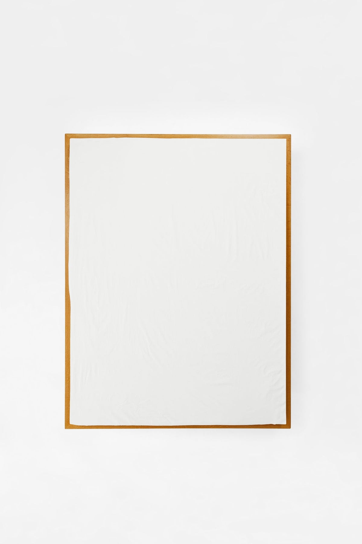Studio Sutram Prism fitted sheet in pure white fitted over a mattress