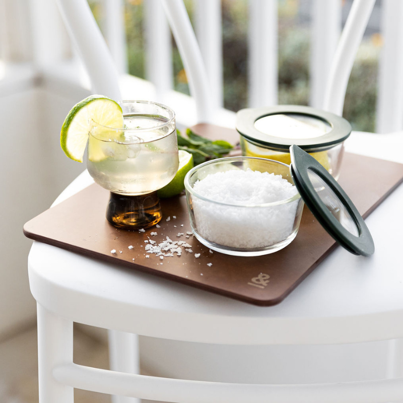 Seed & Sprout Nutmeg wood fibre chopping board used as a serving board with drinks