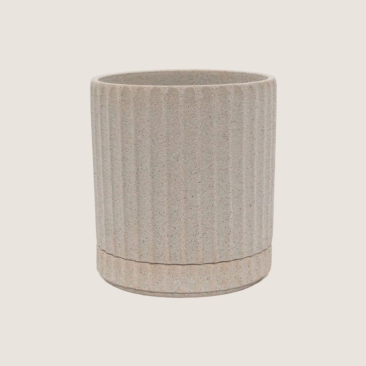 Potted small Athens planter in Sand on a greige background