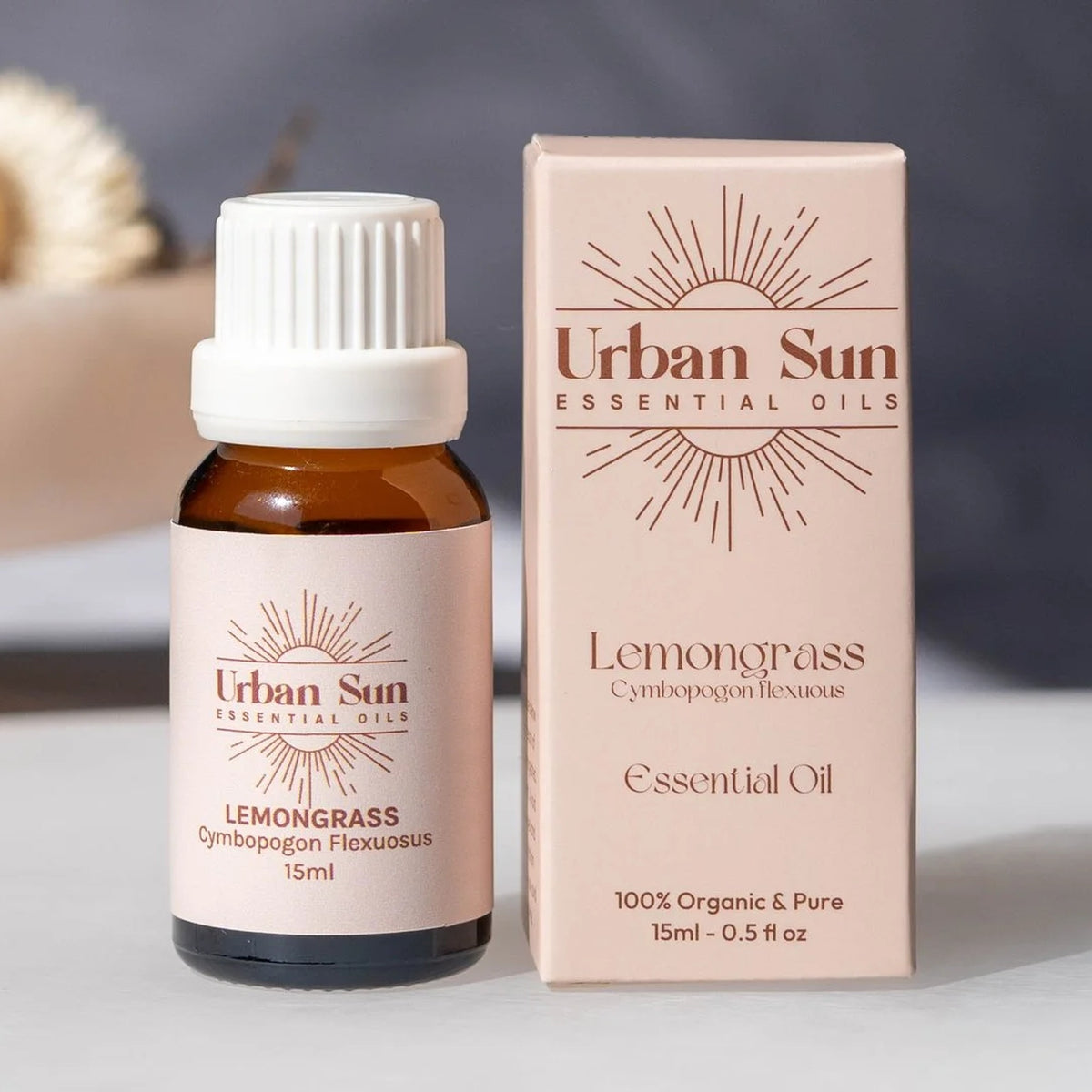 Urban Sun Lemongrass essential oil, 15ml amber glass bottle beside its carton