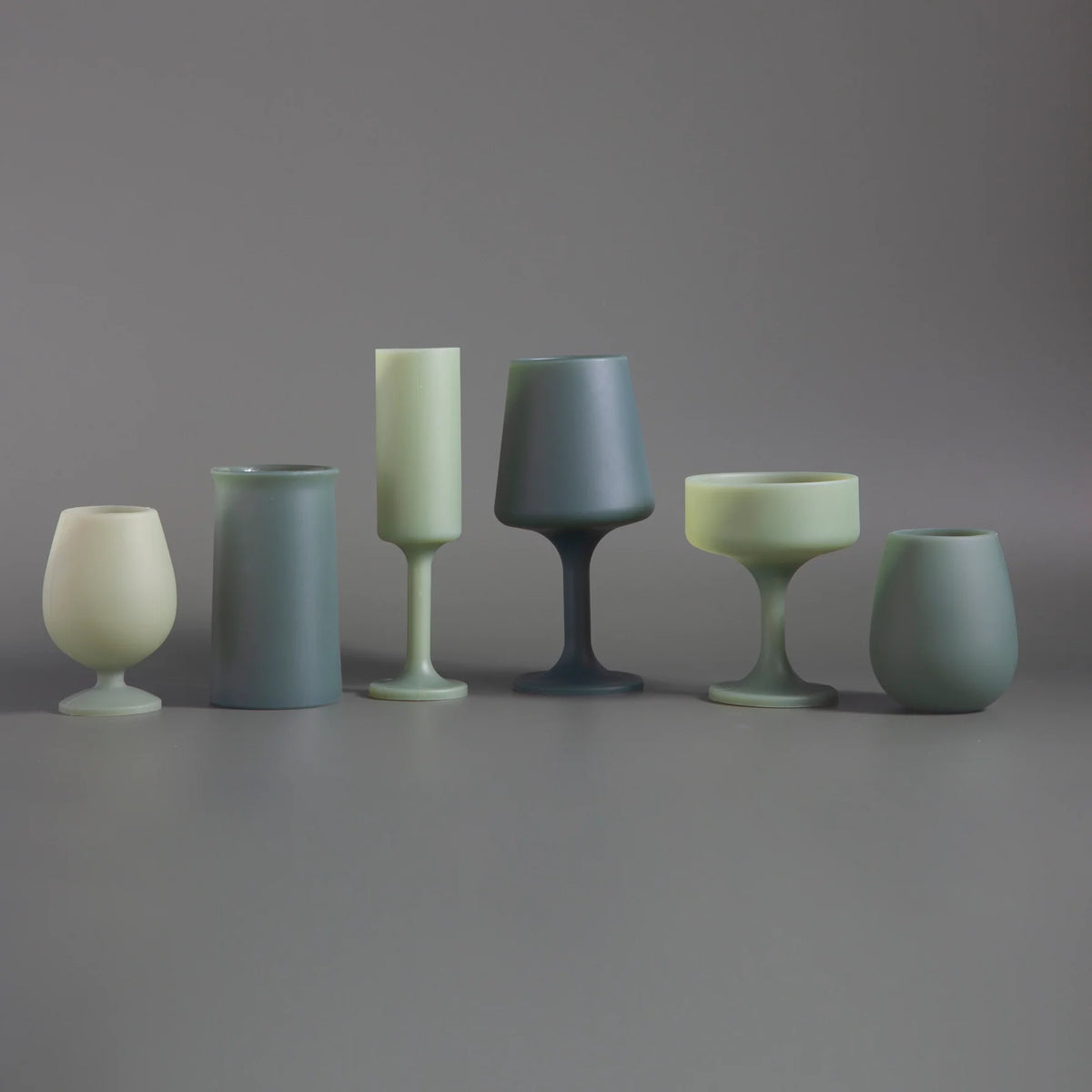 Sage and olive Swepp silicone wine glasses styled outdoors