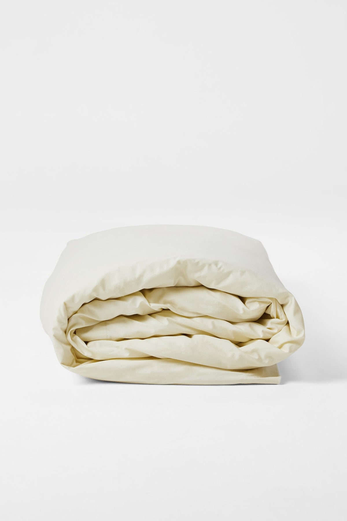 Studio Sutram Canvas duvet cover, side view showing the framing border