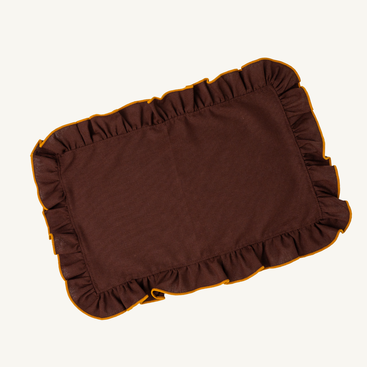 Mesa Collections ruffled placemat in wood brown with caramel trim