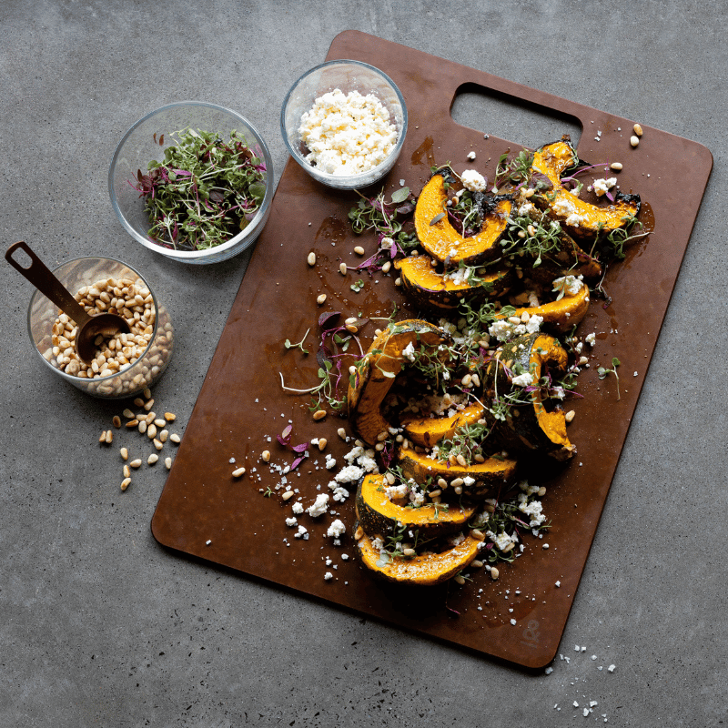 Roast pumpkin and feta served on a Seed & Sprout Nutmeg wood fibre chopping board