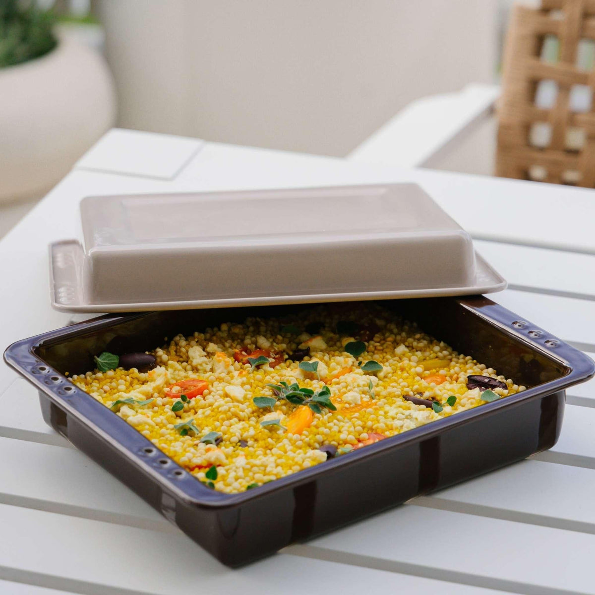 Macadamia enamel roasting dish holding a couscous salad
