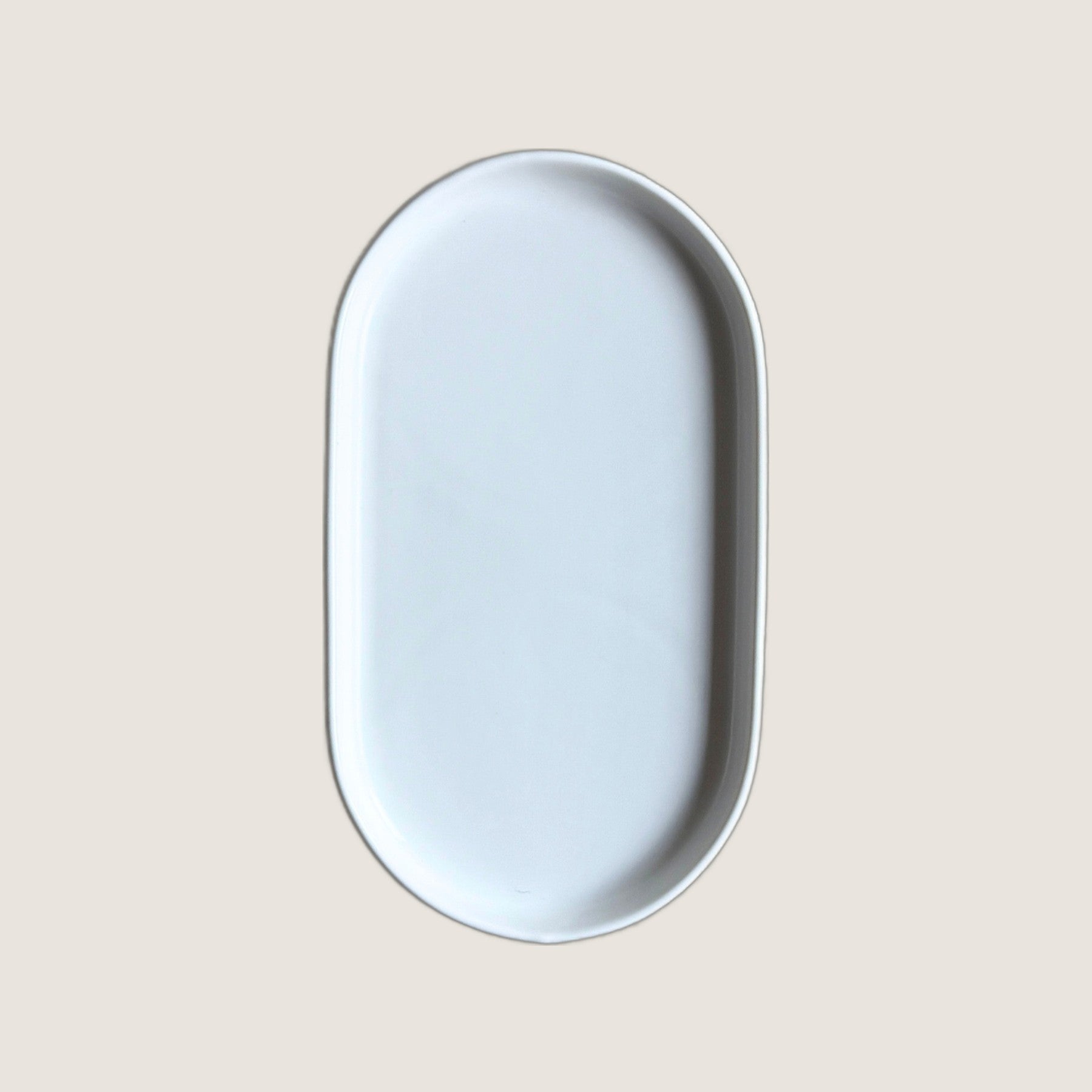 Murchison-Hume Deco oval catchall tray in cashmere ceramic