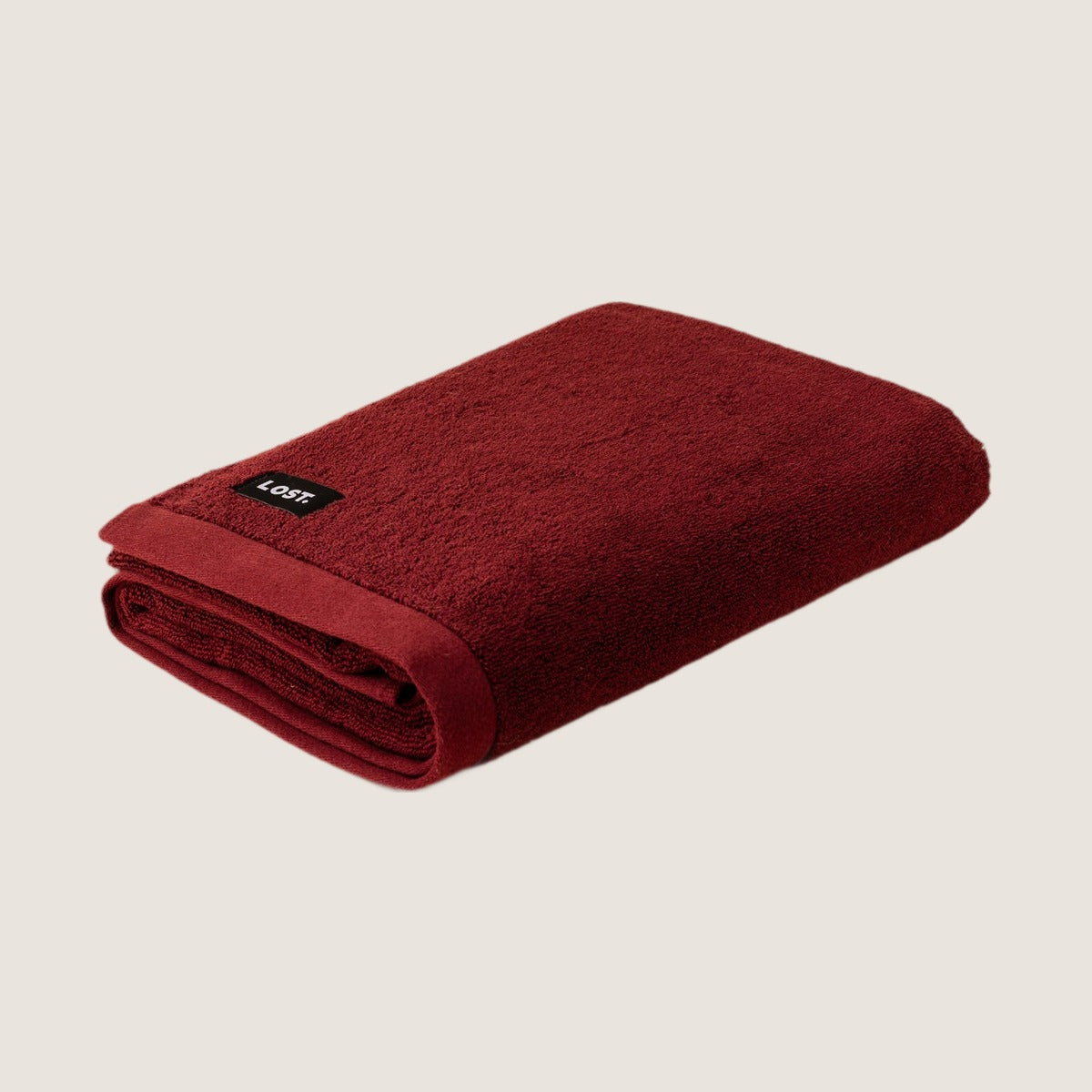 Lost Towels Mulberry bath towel on greige