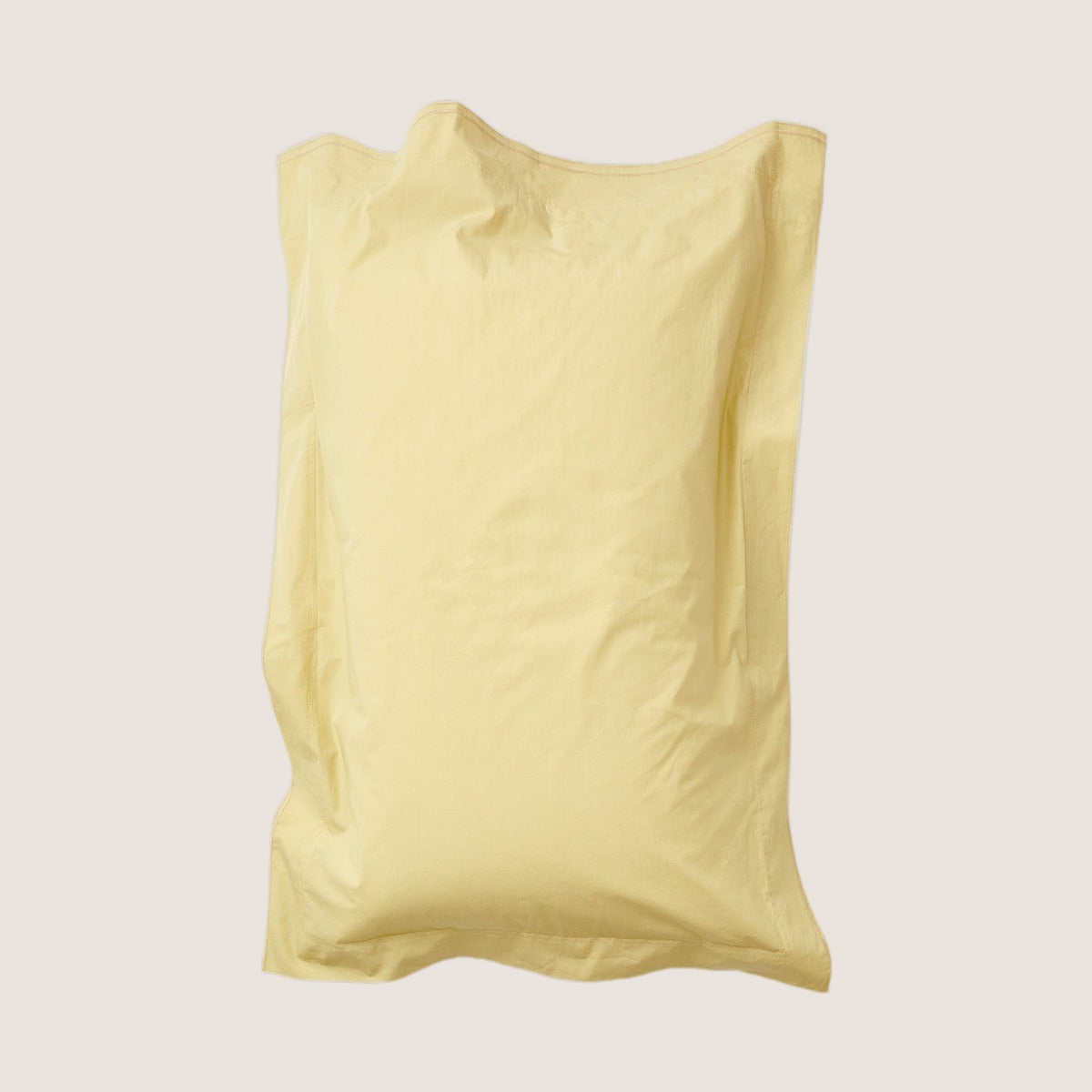 Studio Sutram Maize standard pillowcase pair in soft yellow organic cotton percale