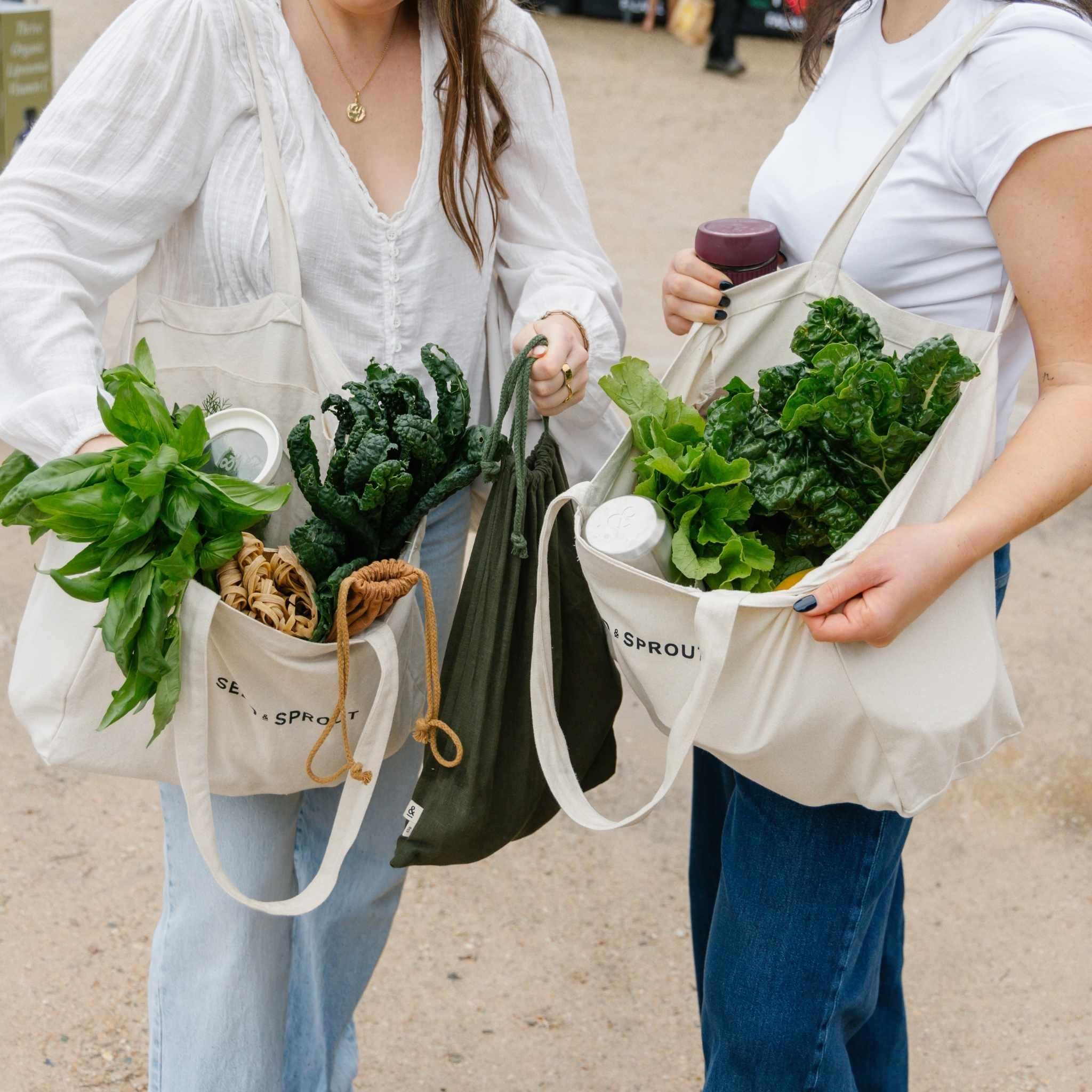 Seed & Sprout hemp bags from the matching range, carried full of fresh produce