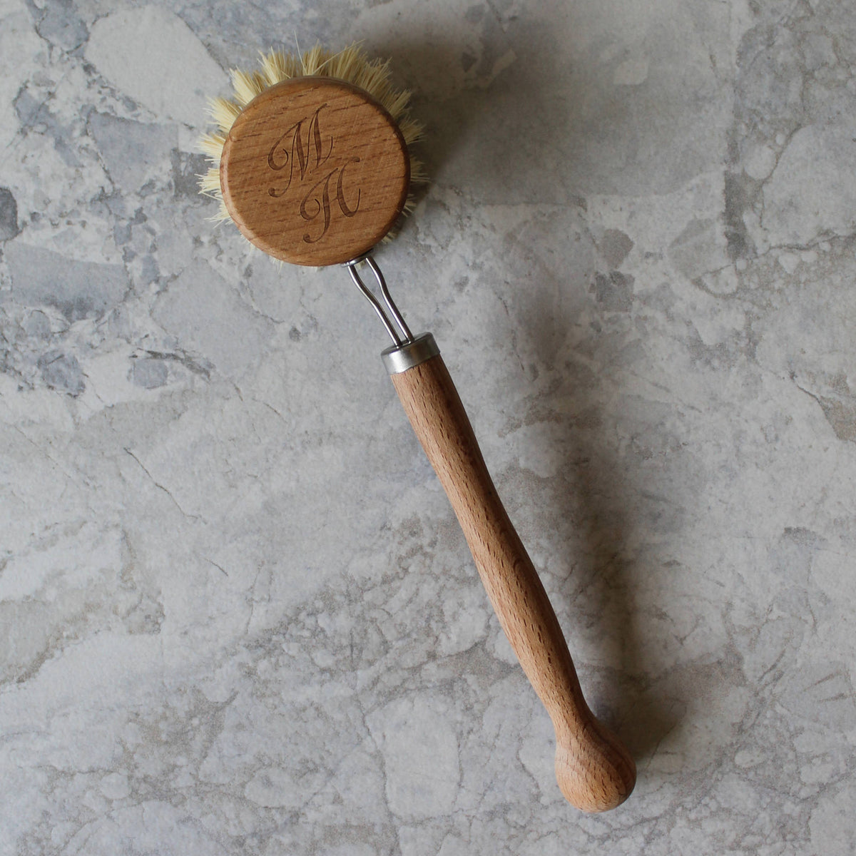 Murchison-Hume dish brush with wooden handle on marble