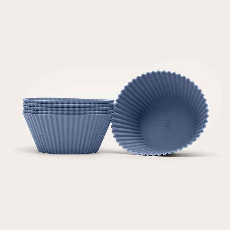 Seed & Sprout silicone muffin cups in Blueberry, stacked with one upright