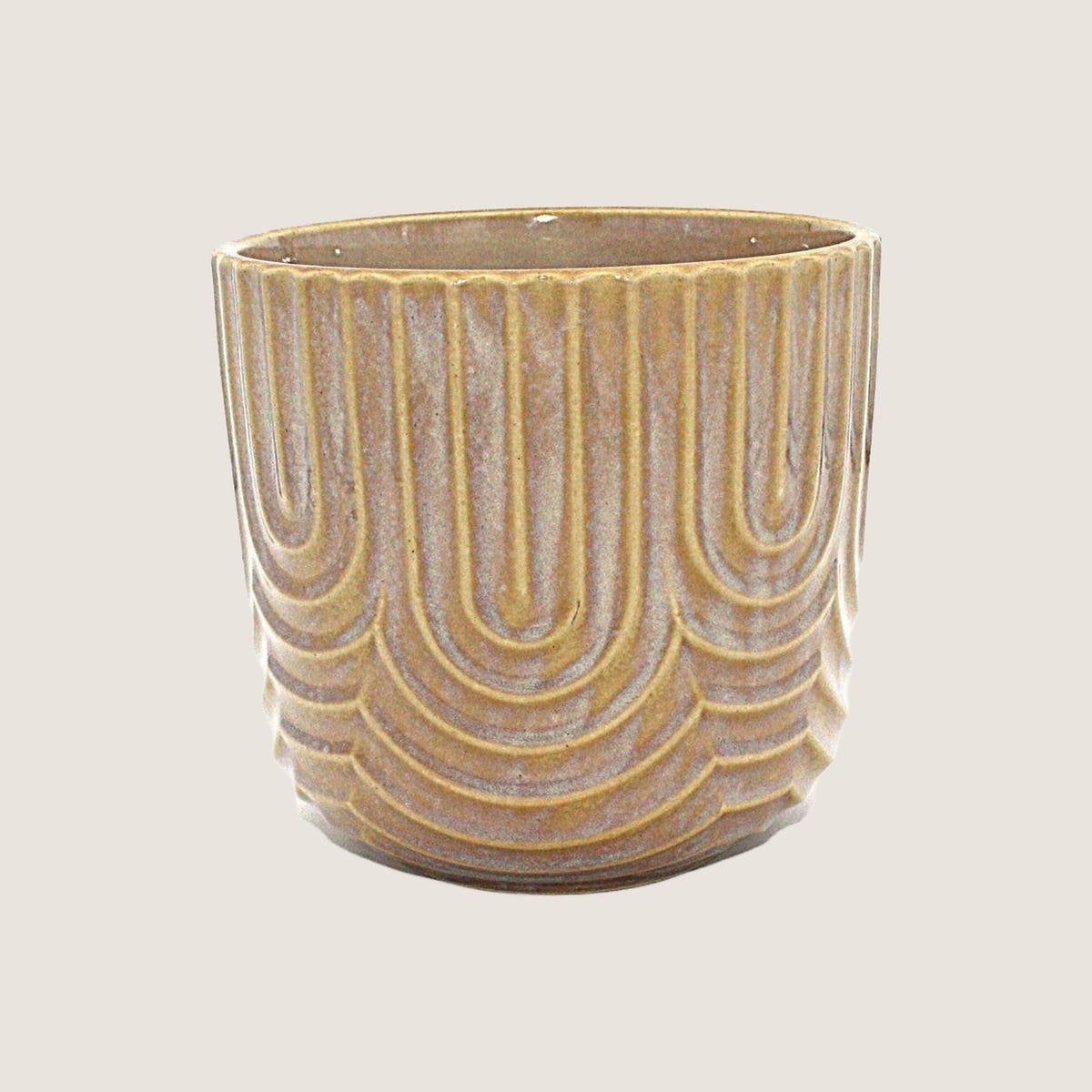 Potted large Hippy planter in Toffee on a greige background
