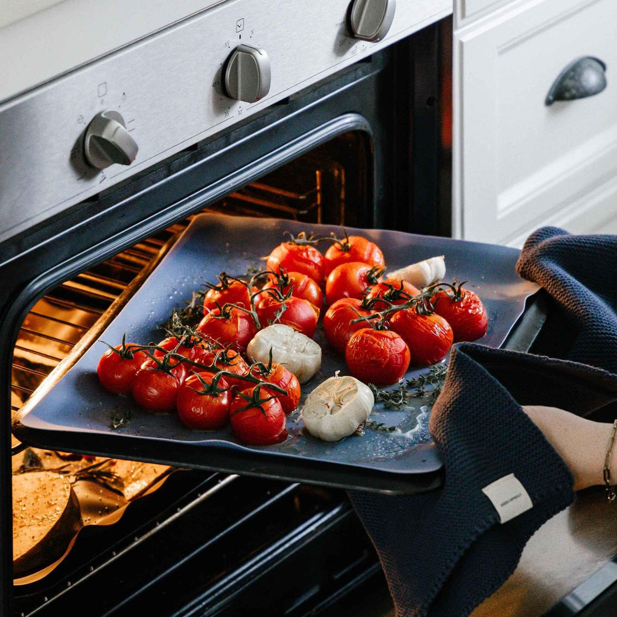 Blueberry silicone baking mat in use in the oven, no baking paper needed