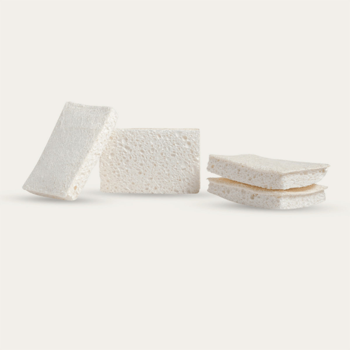 Seed and Sprout compostable sponges showing the loofah scourer face and the cellulose face