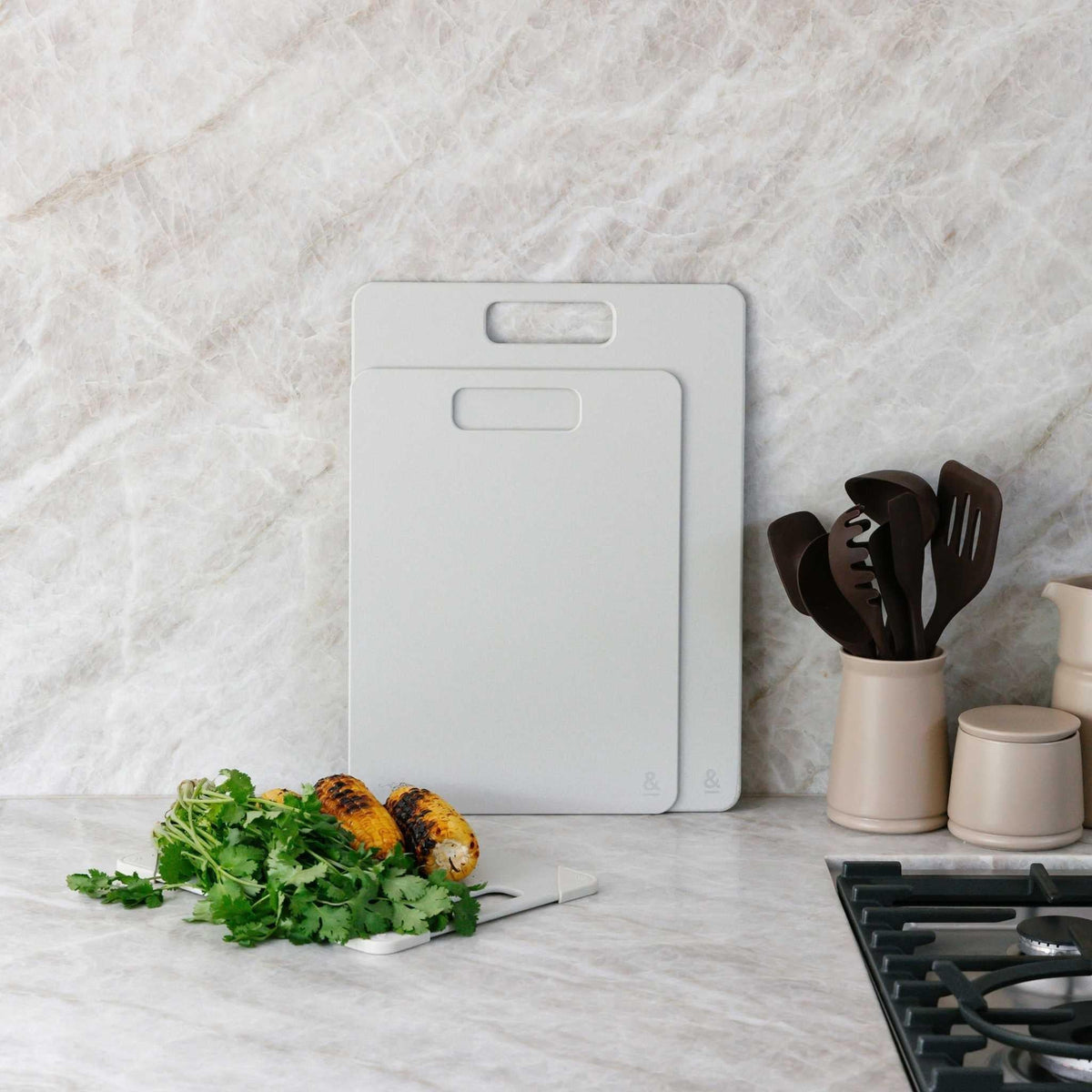 White slim chopping board on a kitchen bench